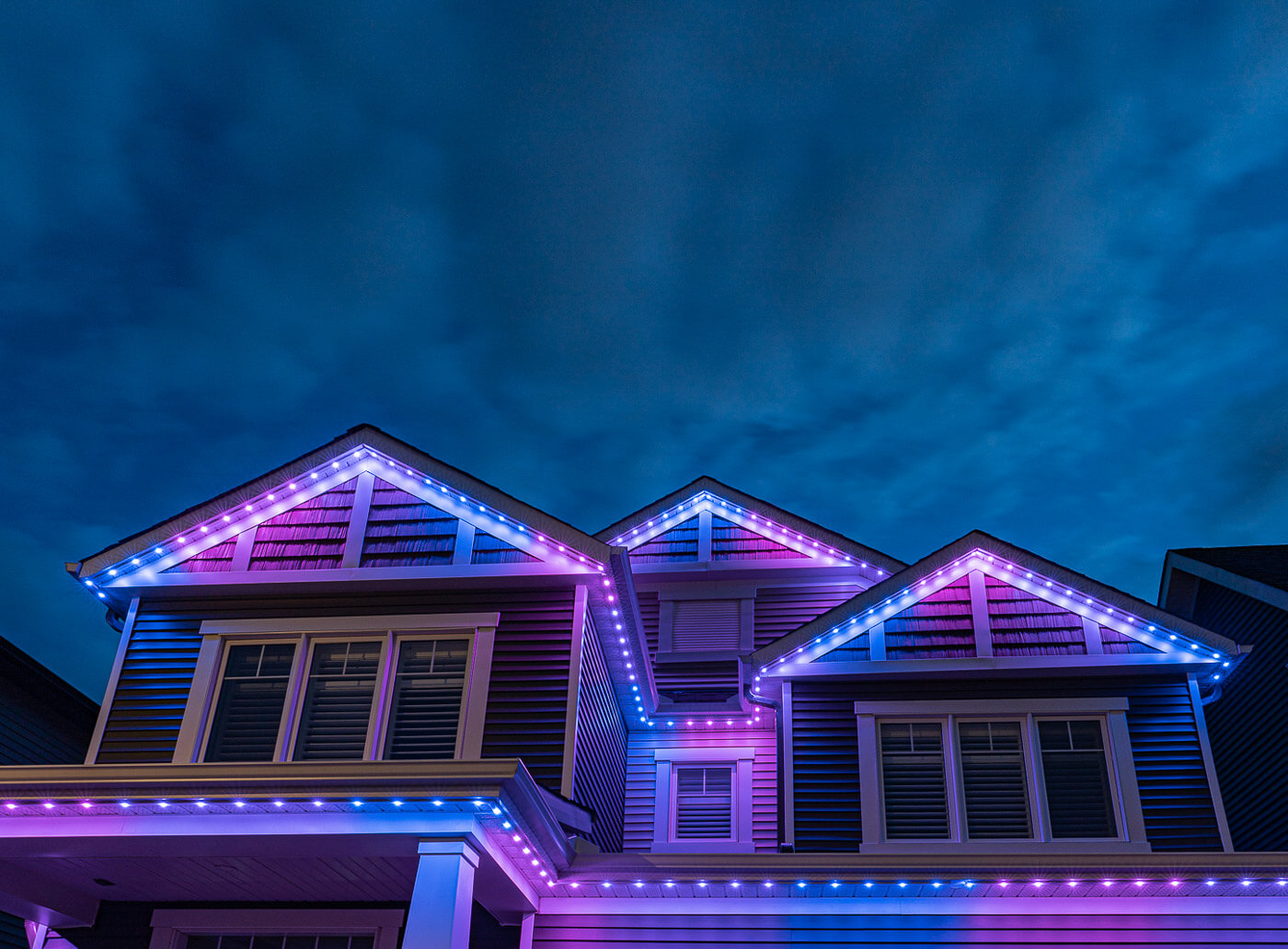Permanent LED architectural lighting system installed on luxury home exterior